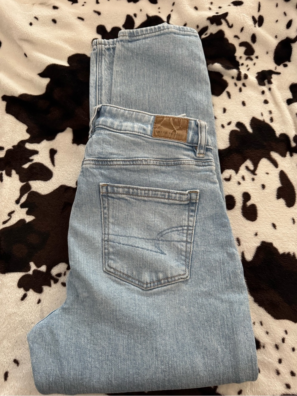 American Eagle Outfitters Light Blue Denim Jeans with Brown Leather Patch